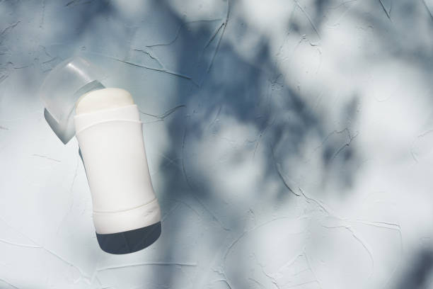 White deodorant stick with an open cap