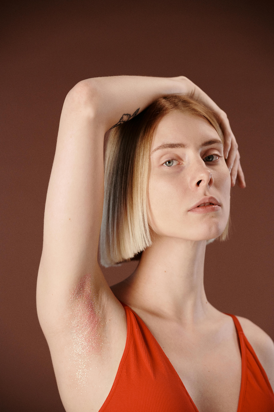 A woman showing her irritated armpit skin