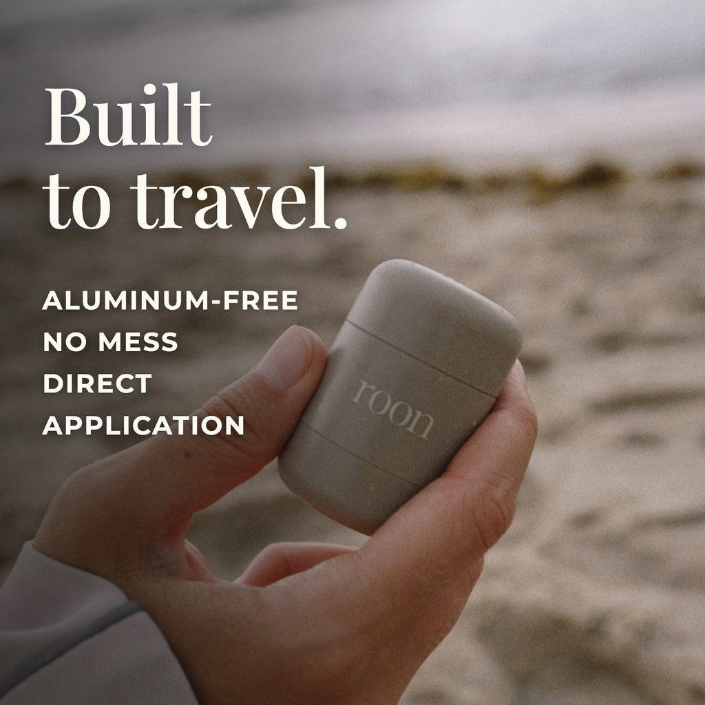 Built to travel — the 15 g Roon mini held in one hand. Aluminum-free, no mess, direct application