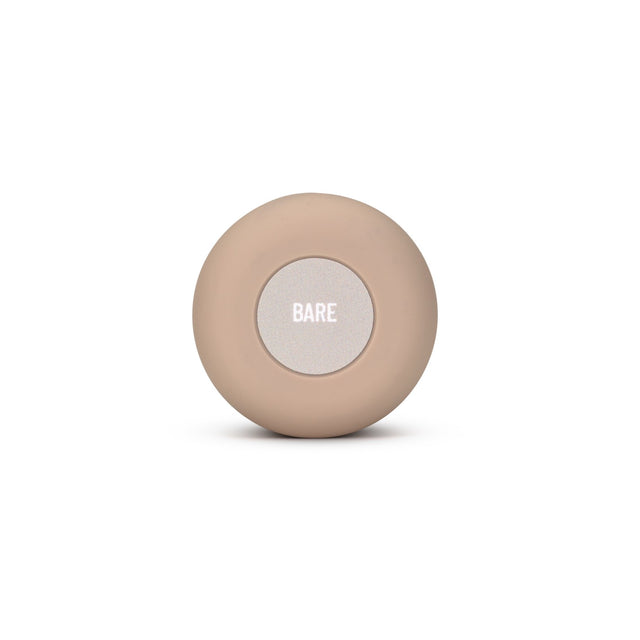 The cap of Roon's Bare tube seen from above, its plain grey dot carrying no scent name